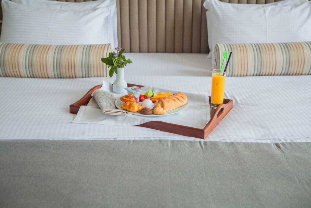 How Top Property Managers Use Software to Deliver 5-Star Guest Service- Zeevou